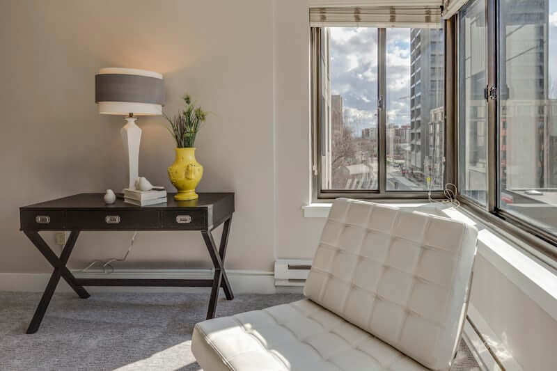 Warm lamp lighting a living room corner on a budget