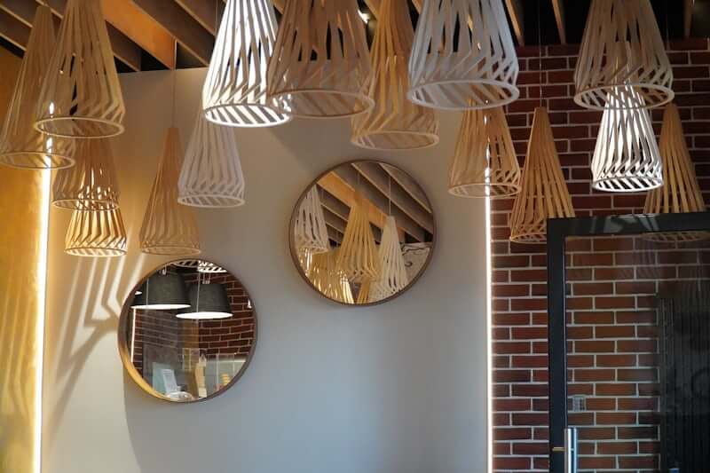 round mirror framed with simple macrame knots