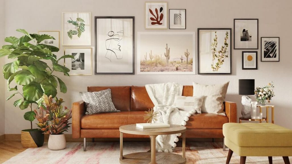 Simple gallery wall with neutral frames above a sofa
