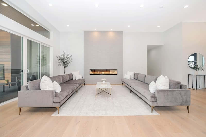 Minimalist living room layout with intentional furniture arrangement
