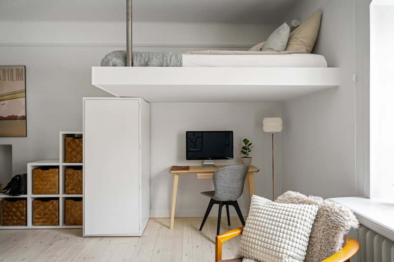 Finished small apartment feeling calm, warm, and lived-in