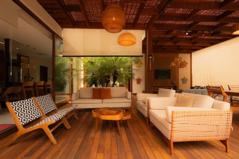Living room with rattan and wicker accents — side table and basket