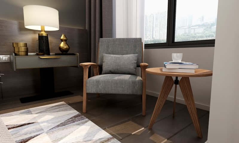Cozy reading corner with armchair, floor lamo, and soft throws