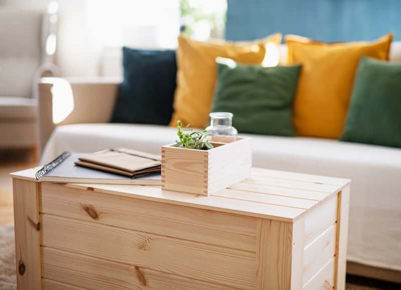 Nesting tables used as flexible furniture in a small living room
