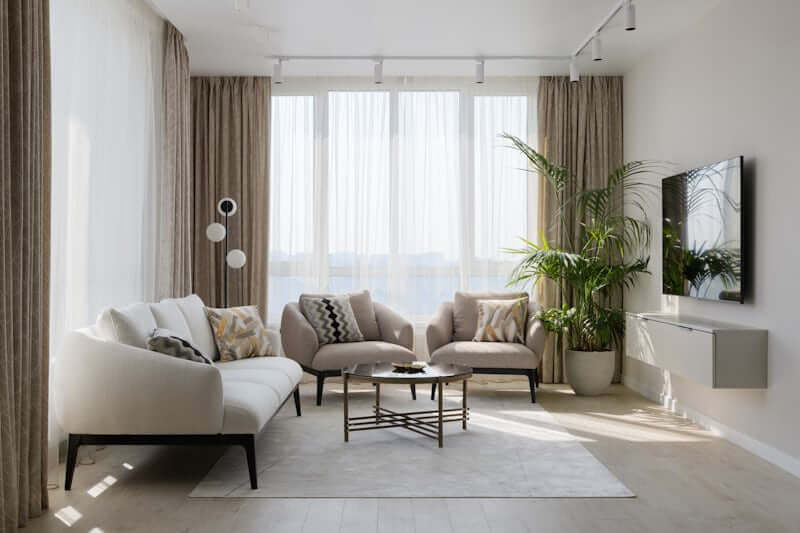 Furniture with raised thin legs opening up floor space in a small room