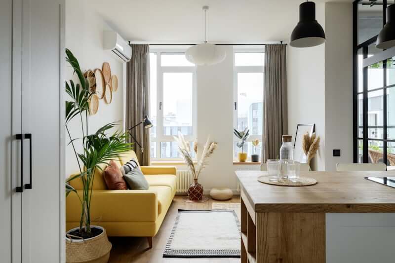 Small-scale loveseat fitted to a compact living room layout