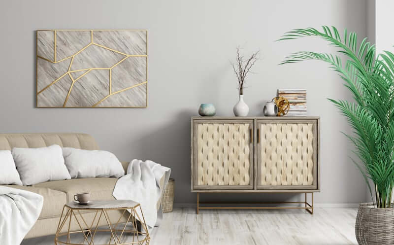 Sofa styled with layered cushions in warm neutrals and textures