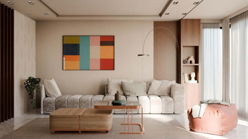 Living room with three-colour pallete - cream, warm brown, sage green 