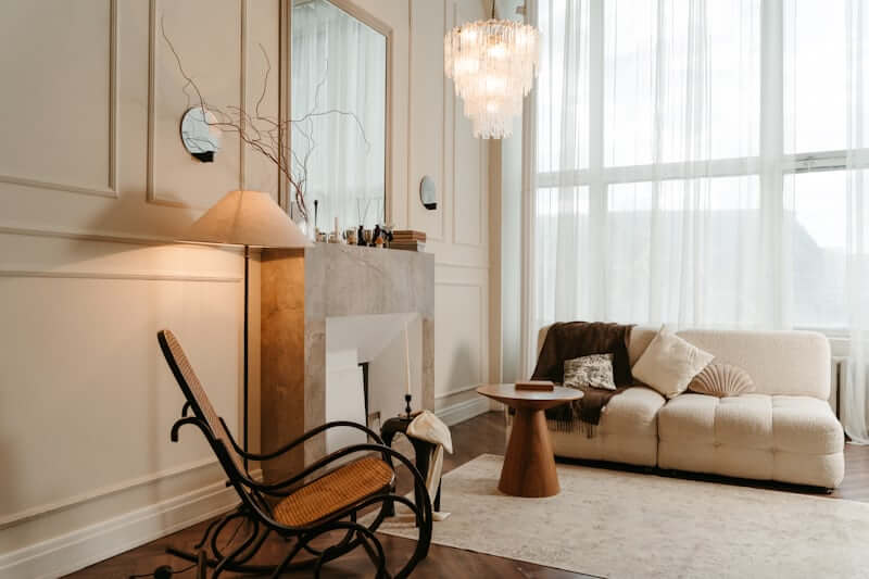 Mixed textures and warm tones in a neutral living room