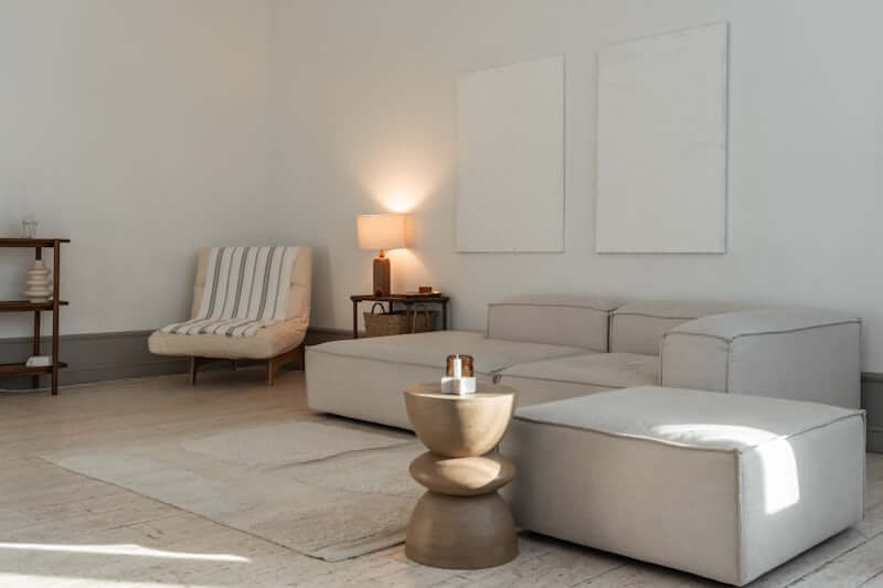 Layered lighting sources creating warmth in a living room