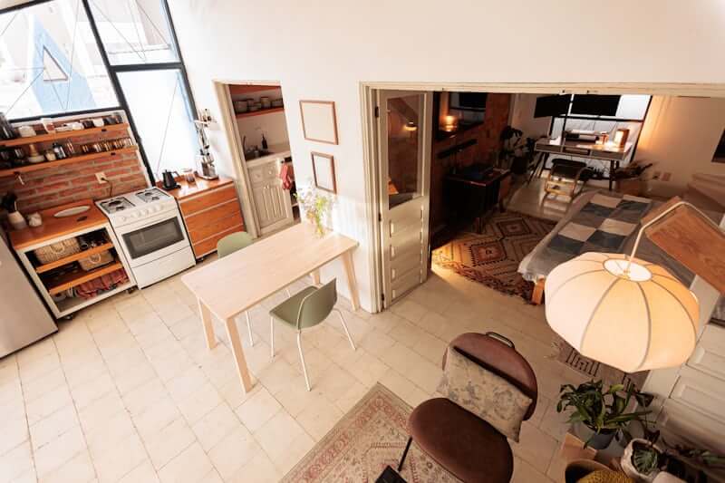 Small space apartment living styled with warm, functional decor